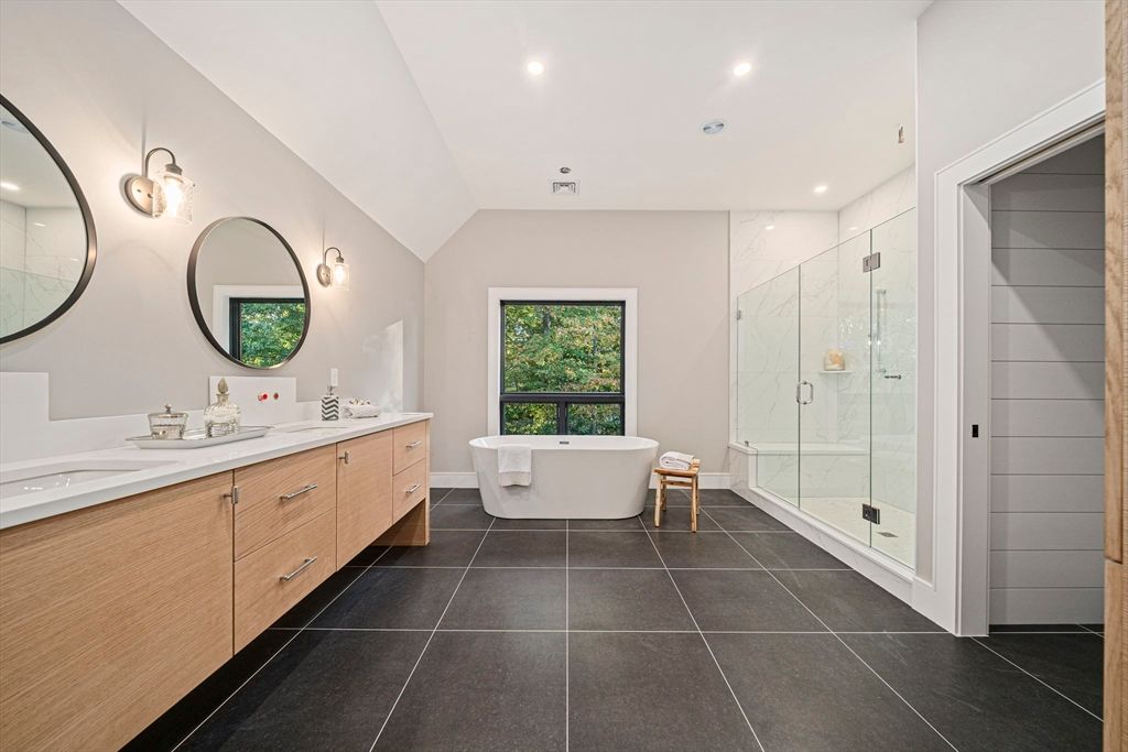 Bathroom, Dual Sink Vanities, Free Standing Baths, Glass Shower, Interior, Marble Walls, Recessed Lighting