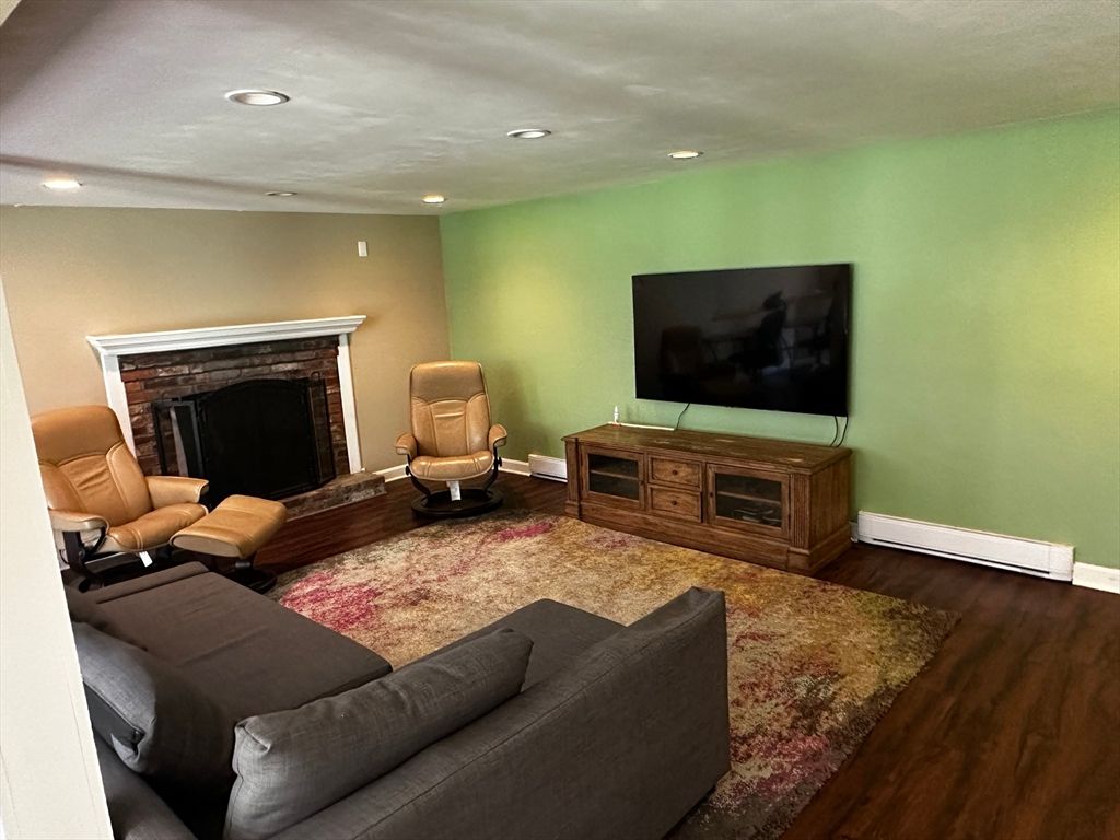 Fireplace, Interior, Living room, Recessed Lighting, Wood Texture Flooring