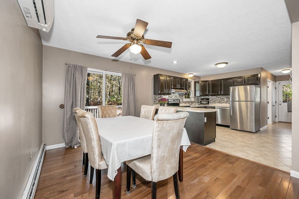 Dining room, Interior, Kitchen, Recessed Lighting, Stainless Steel Appliances, Wood Texture Flooring