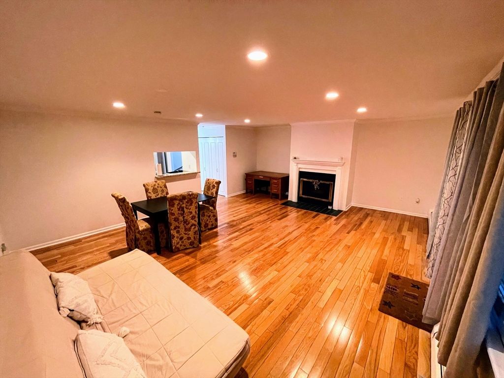 Bedroom, Dining room, Fireplace, Interior, Recessed Lighting, Wood Texture Flooring