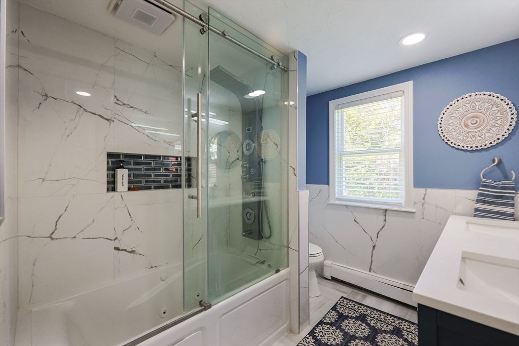 Bathroom, Glass Shower, Interior, Marble Walls, Recessed Lighting, Wood Texture Flooring