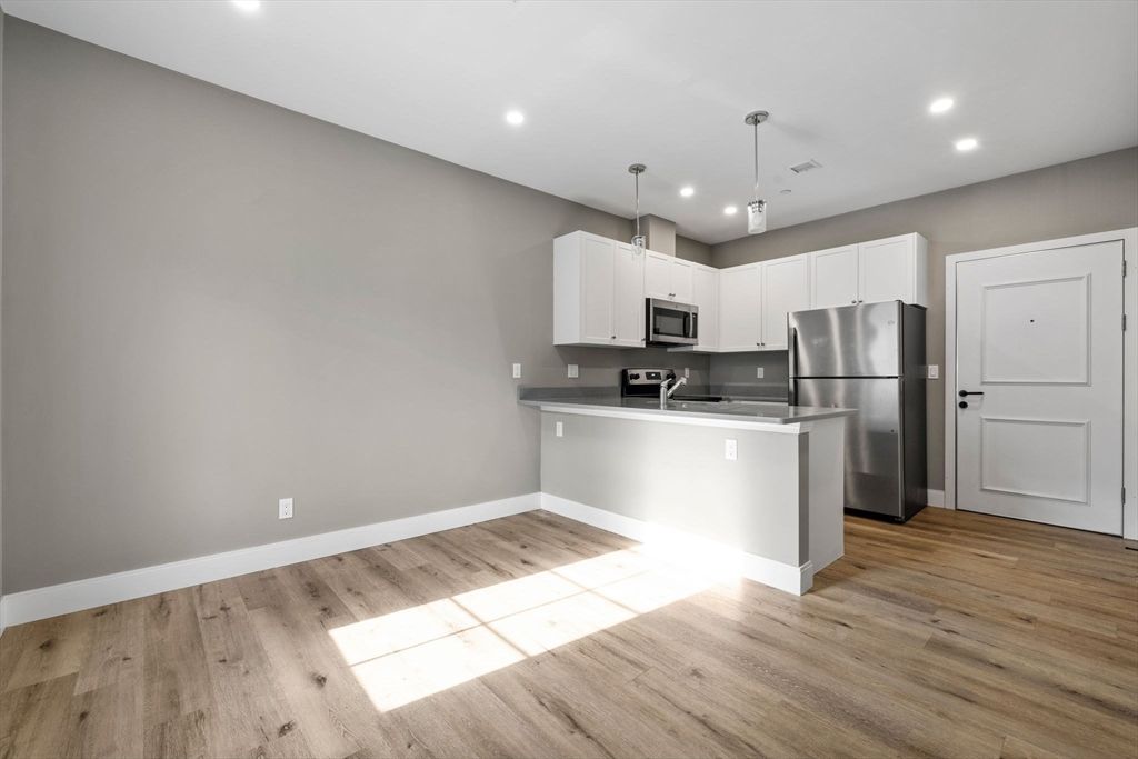 Interior, Kitchen, Pendant Lights, Recessed Lighting, Stainless Steel Appliances, Wood Texture Flooring