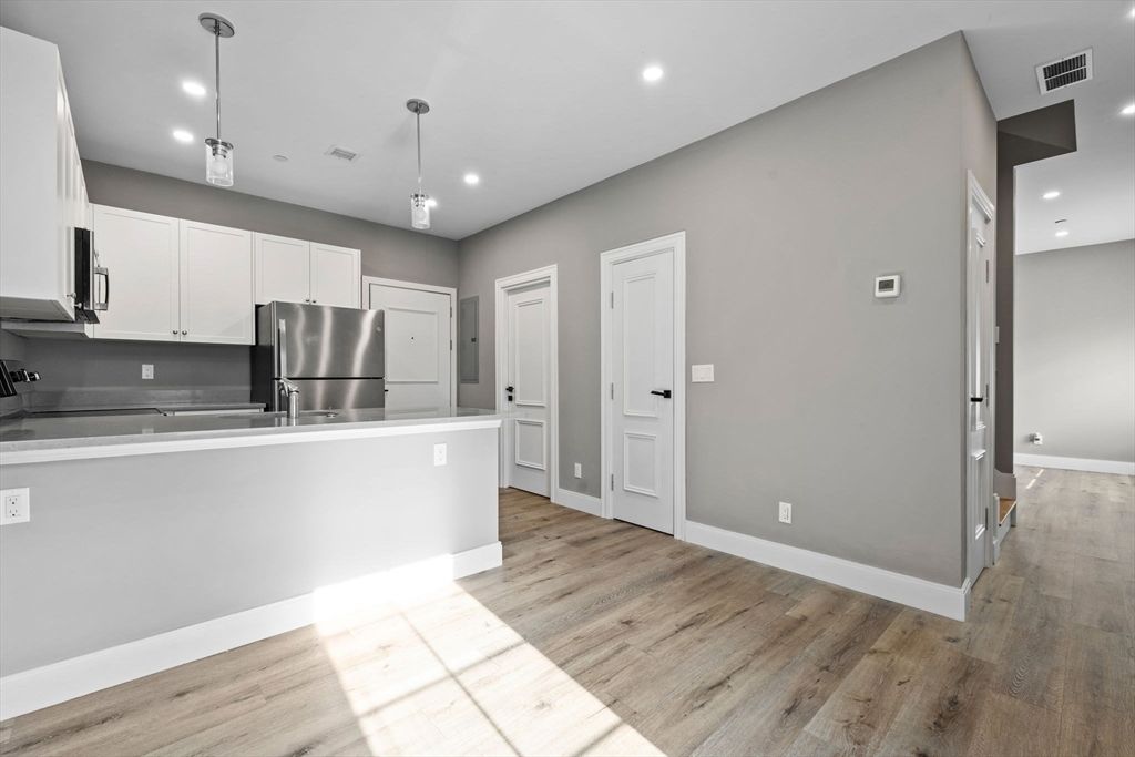 Interior, Kitchen, Pendant Lights, Recessed Lighting, Stainless Steel Appliances, Wood Texture Flooring