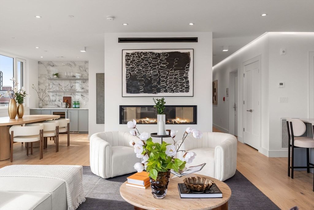 Dining room, Fireplace, Interior, Living room, Marble Walls, Recessed Lighting, Wood Texture Flooring