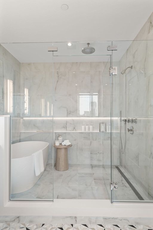 Bathroom, Free Standing Baths, Glass Shower, Interior, Marble, Marble Walls, Recessed Lighting