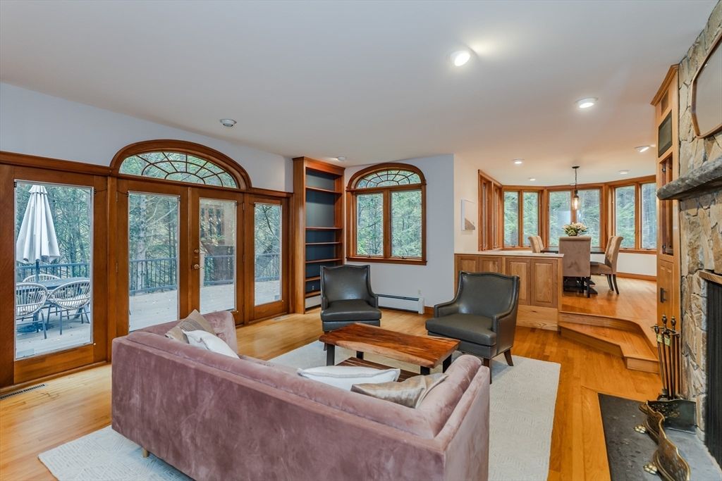 Dining room, Fireplace, Interior, Living room, Recessed Lighting, Wood Texture Flooring