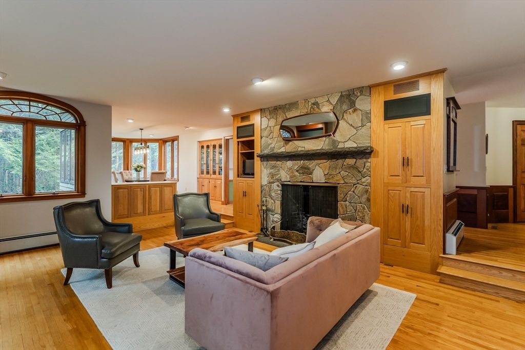 Fireplace, Interior, Living room, Pendant Lights, Recessed Lighting, Stone Walls, Wood Texture Flooring