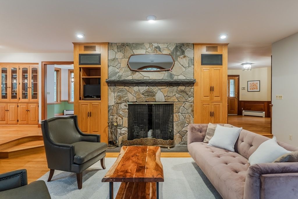 Fireplace, Interior, Living room, Recessed Lighting, Stone Walls, Wood Texture Flooring