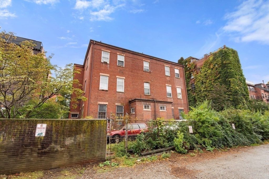 Exterior, Facade, Brick Facade, Condo Building