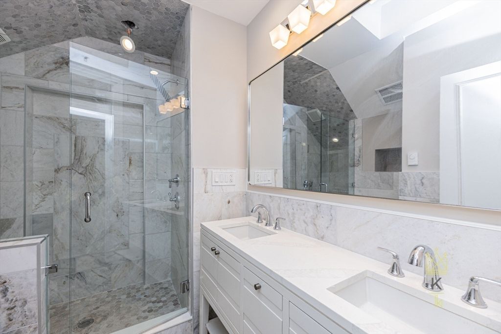 Bathroom, Dual Sink Vanities, Glass Shower, Interior, Marble Walls