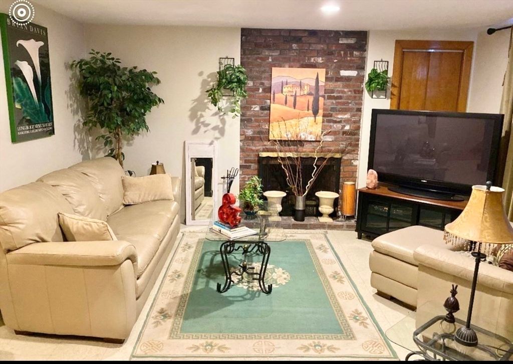 Fireplace, Interior, Living room, Pool, Recessed Lighting, Stone Walls