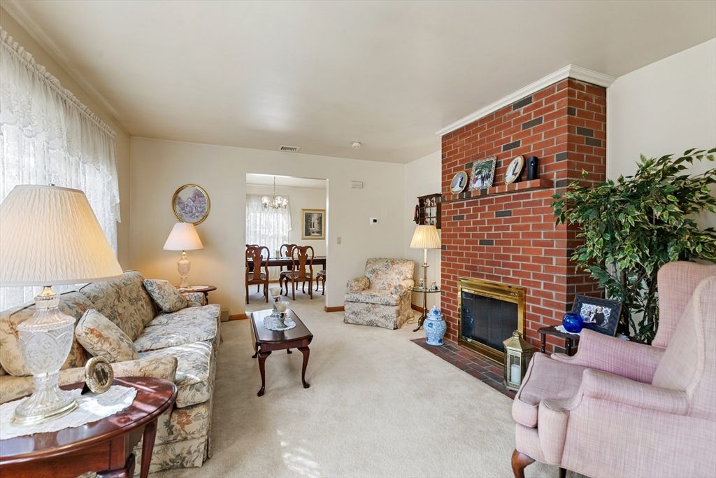 Chandelier, Dining room, Fireplace, Interior, Living room, Pendant Lights, Stone Walls