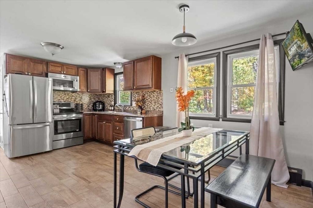 Dining room, Interior, Kitchen, Pendant Lights, Stainless Steel Appliances, Wood Texture Flooring