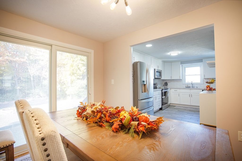 Dining room, Interior, Kitchen, Recessed Lighting, Stainless Steel Appliances, Wood Texture Flooring
