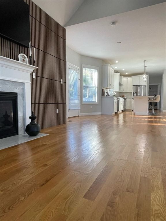 Chandelier, Fireplace, Interior, Kitchen, Pendant Lights, Recessed Lighting, Wood Texture Flooring