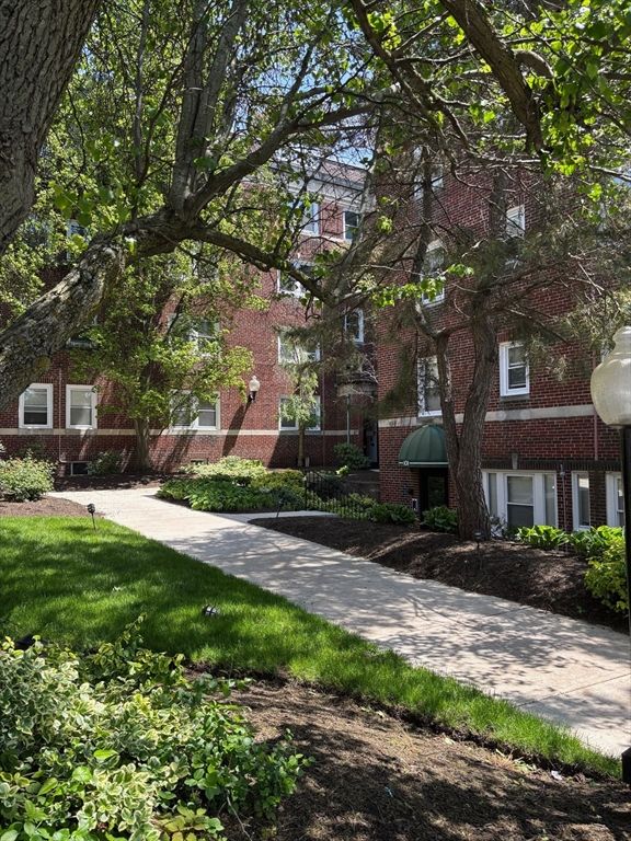 Exterior, Facade, Brick Facade, Condo Building