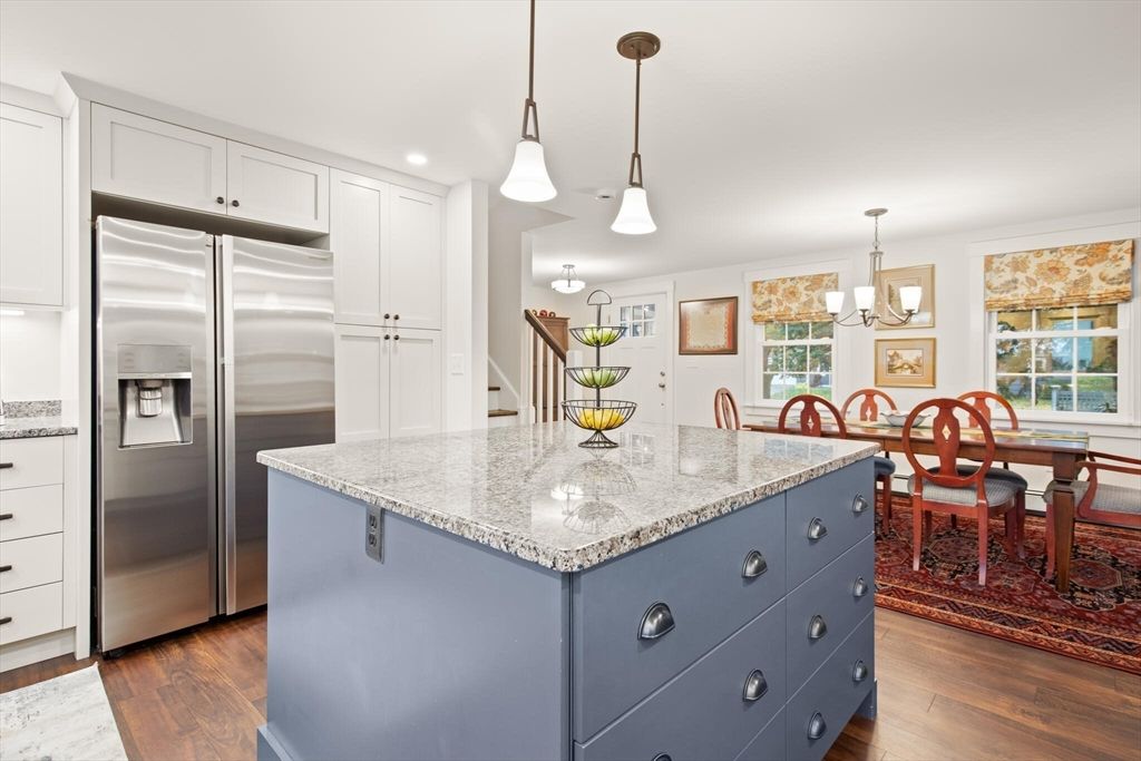 Chandelier, Dining room, Interior, Kitchen, Pendant Lights, Recessed Lighting, Stainless Steel Appliances, Wood Texture Flooring