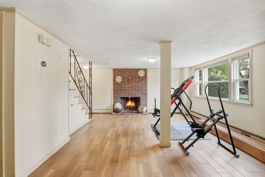 Fireplace, Fitness Equipment, Interior, Stone Walls, Wood Texture Flooring