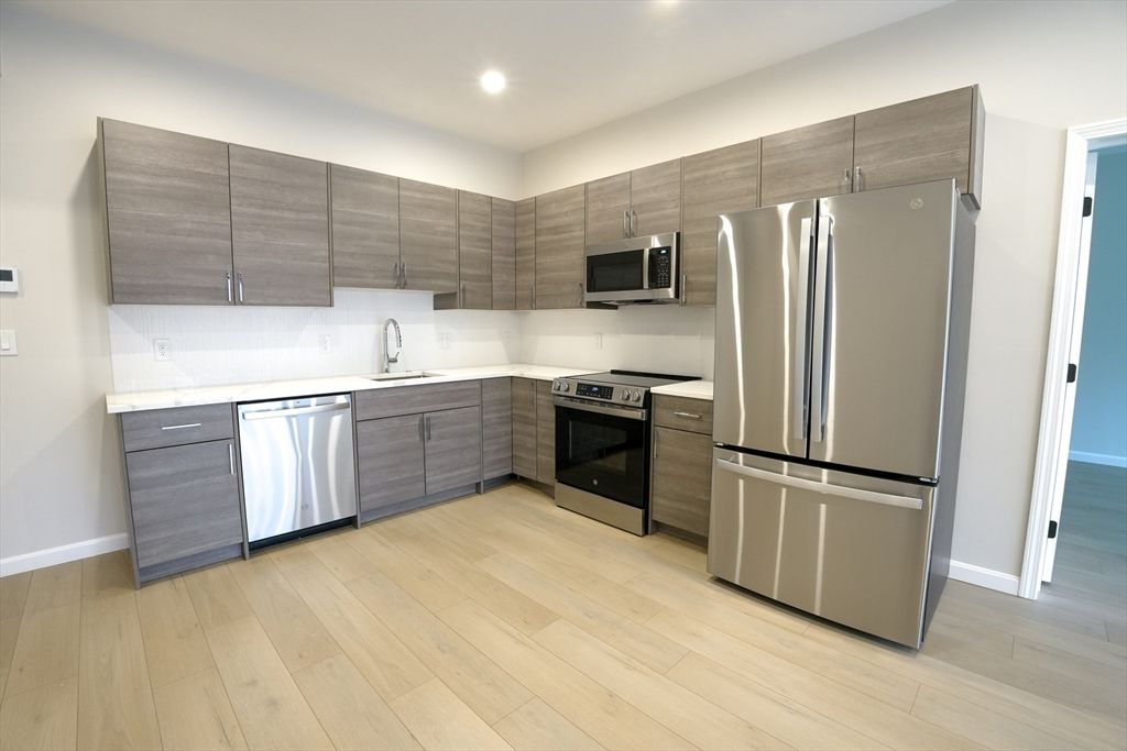 Interior, Kitchen, Recessed Lighting, Stainless Steel Appliances, Wood Texture Flooring