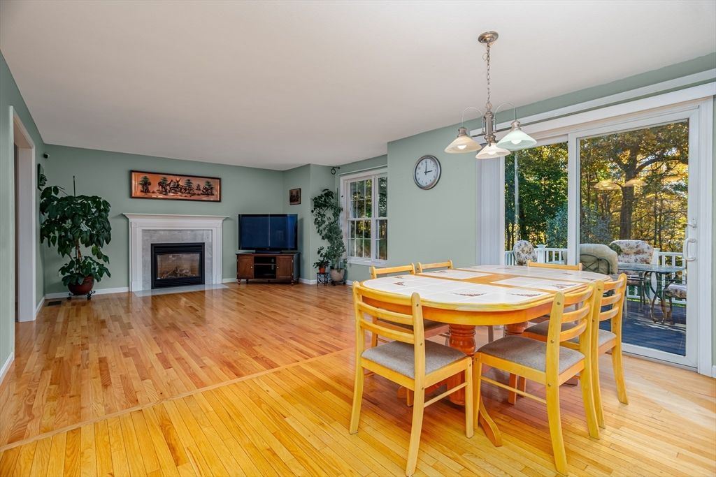 Dining room, Fireplace, Interior, Pendant Lights, Wood Texture Flooring