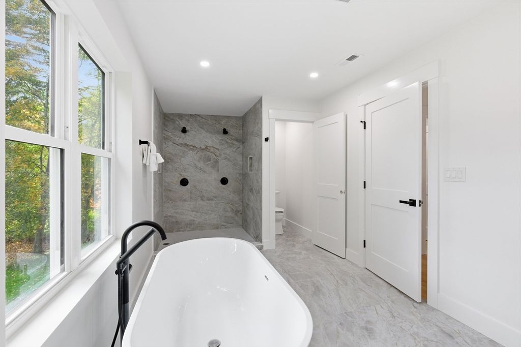 Bathroom, Free Standing Baths, Interior, Marble, Marble Walls, Recessed Lighting