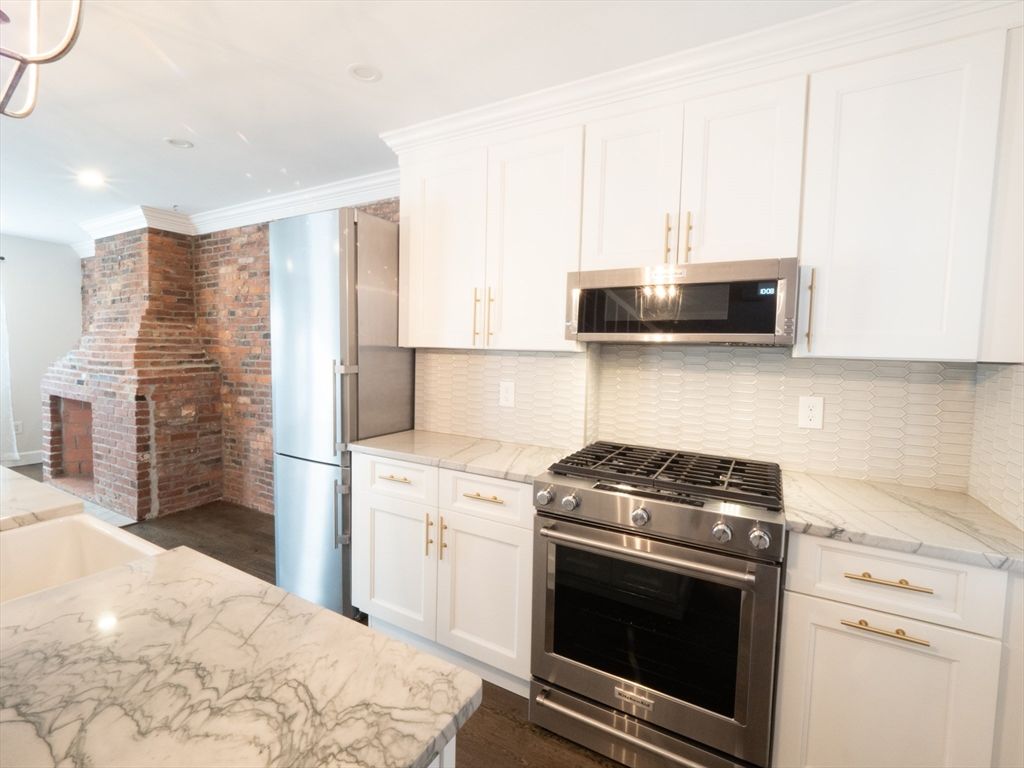Interior, Kitchen, Recessed Lighting, Stainless Steel Appliances, Stone Walls