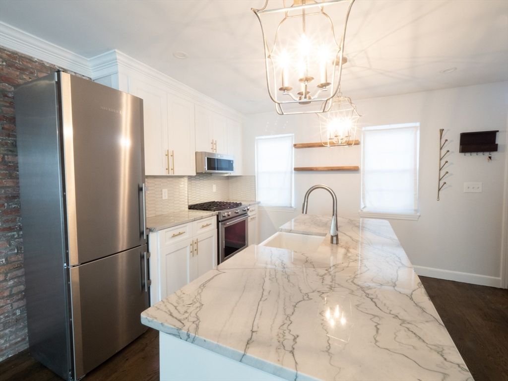 Chandelier, Interior, Kitchen, Recessed Lighting, Stainless Steel Appliances, Wood Texture Flooring