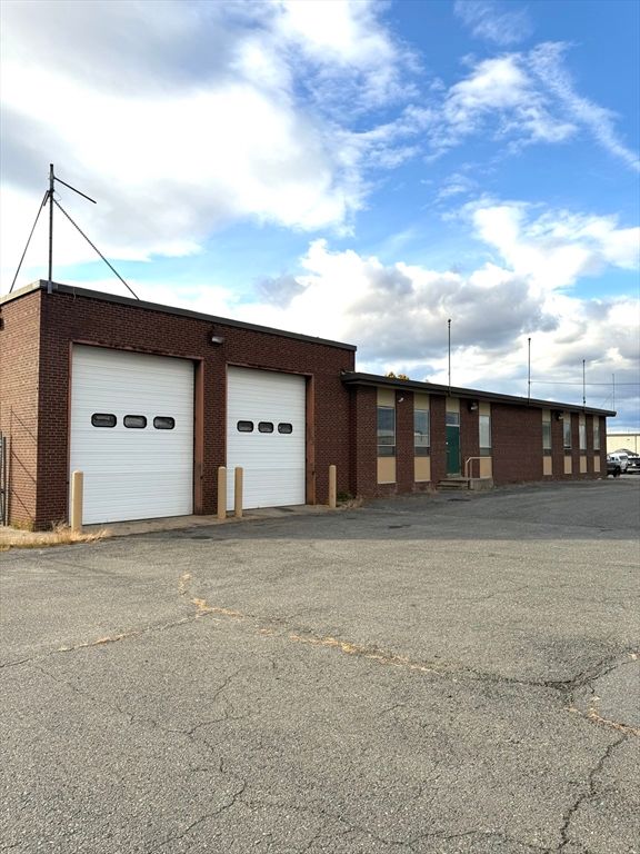 Attached, Exterior, Facade, Brick Facade, Condo Building