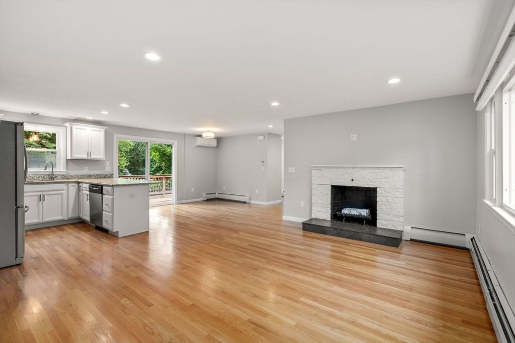 Empty room, Fireplace, Interior, Kitchen, Recessed Lighting, Wood Texture Flooring