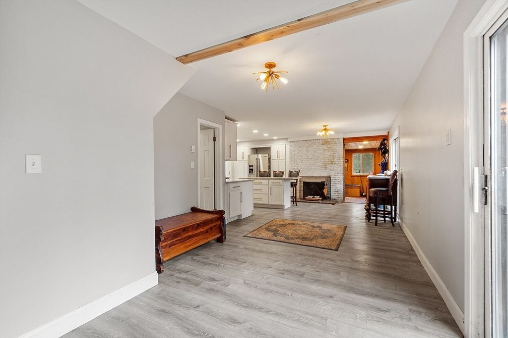 Fireplace, Interior, Kitchen, Recessed Lighting, Stone Walls, Wood Texture Flooring