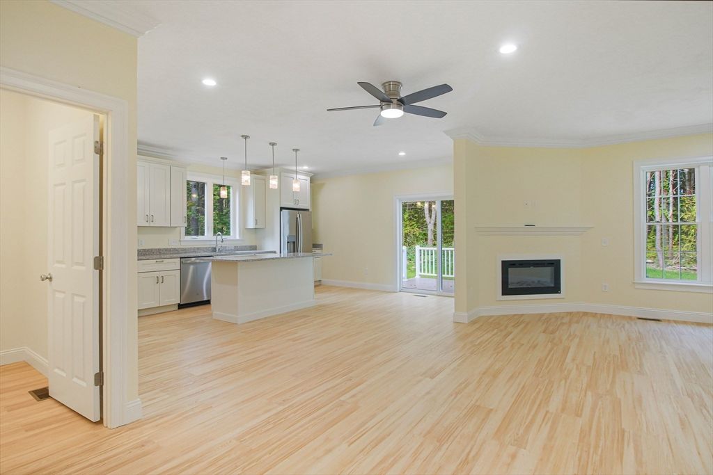 Empty room, Fireplace, Interior, Kitchen, Pendant Lights, Recessed Lighting, Wood Texture Flooring