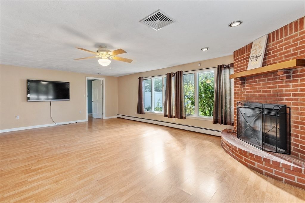 Empty room, Fireplace, Interior, Recessed Lighting, Stone Walls, Wood Texture Flooring