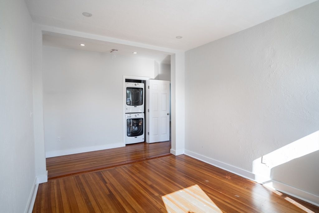 Empty room, Interior, Recessed Lighting, Utility Closets, Washer, Wood Texture Flooring