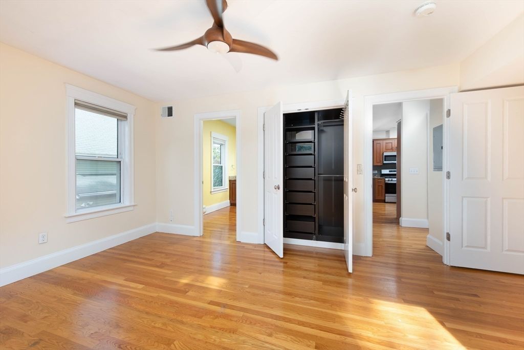Empty room, Interior, Kitchen, Stainless Steel Appliances, Wood Texture Flooring