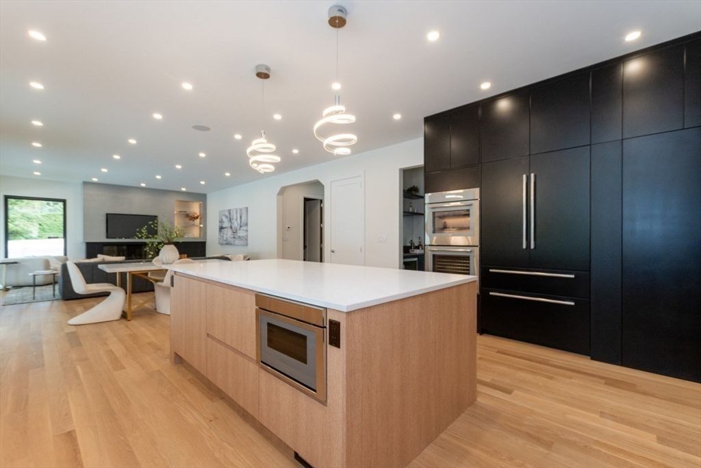 Dining room, Interior, Kitchen, Living room, Pendant Lights, Recessed Lighting, Stainless Steel Appliances, Wood Texture Flooring