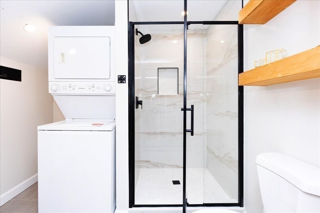 Bathroom, Glass Shower, Interior, Marble Walls, Recessed Lighting, Utility Closets, Washer