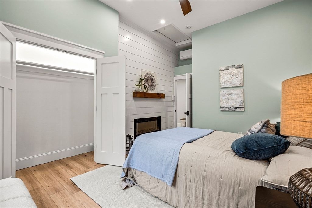 Bedroom, Fireplace, Interior, Recessed Lighting, Wood Texture Flooring