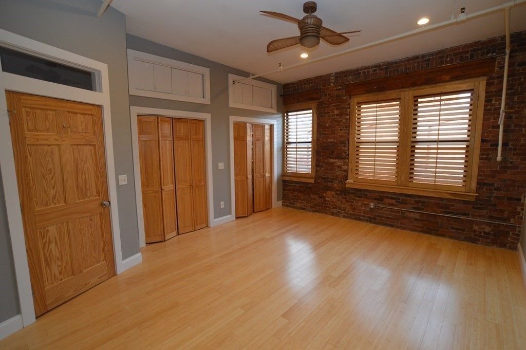 Empty room, Interior, Recessed Lighting, Stone Walls, Wood Texture Flooring