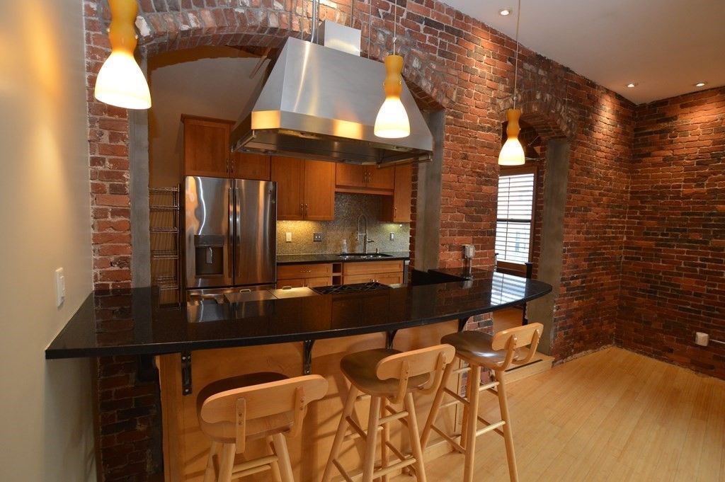 Interior, Kitchen, Pendant Lights, Recessed Lighting, Stainless Steel Appliances, Stone Walls, Wood Texture Flooring