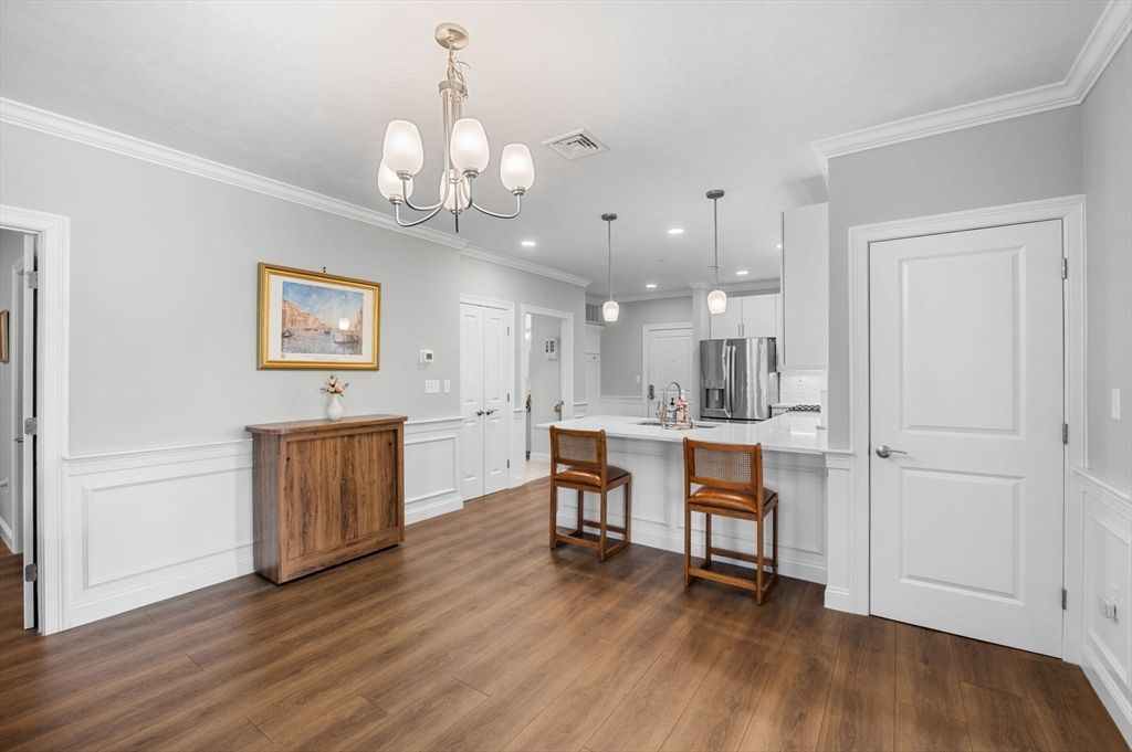 Chandelier, Interior, Kitchen, Pendant Lights, Recessed Lighting, Stainless Steel Appliances, Wood Texture Flooring