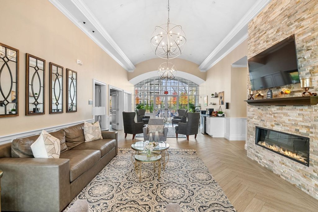 Chandelier, Fireplace, Interior, Living room, Pendant Lights, Stone Walls, Wood Texture Flooring