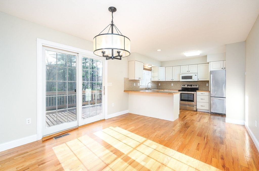 Chandelier, Interior, Kitchen, Recessed Lighting, Stainless Steel Appliances, Wood Texture Flooring