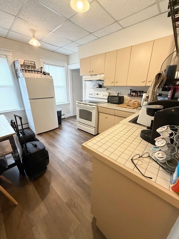 Interior, Kitchen, Tile Countertops, Wood Texture Flooring