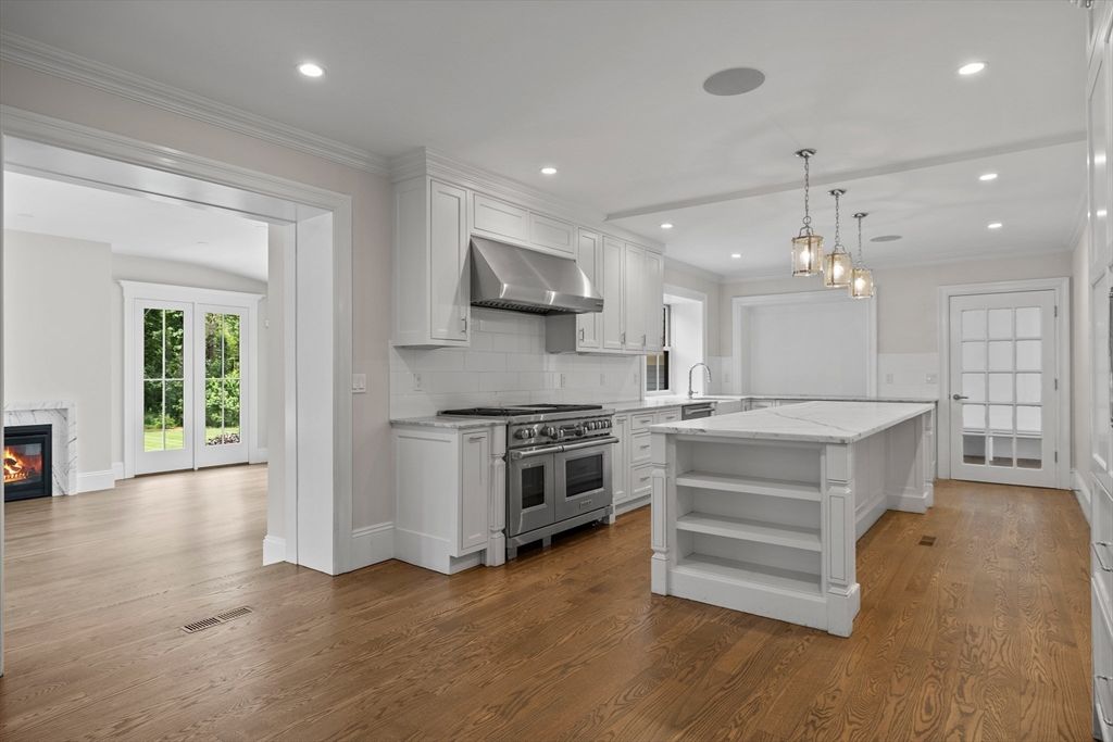 Fireplace, Interior, Kitchen, Pendant Lights, Recessed Lighting, Stainless Steel Appliances, Wood Texture Flooring