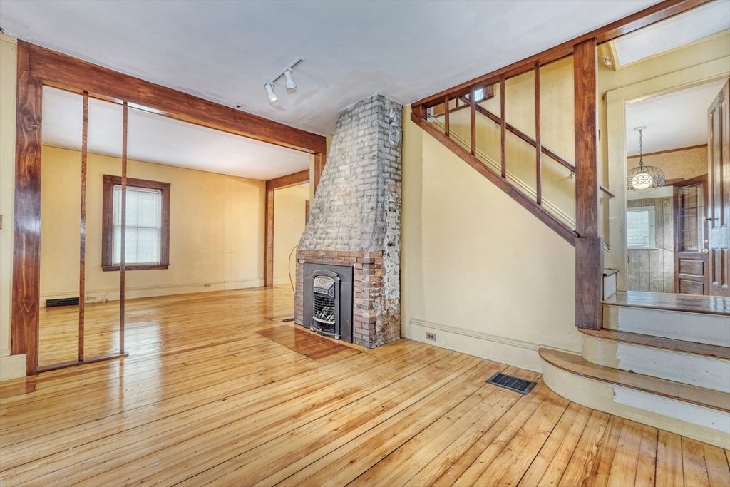 Empty room, Fireplace, Interior, Pendant Lights, Wood Texture Flooring