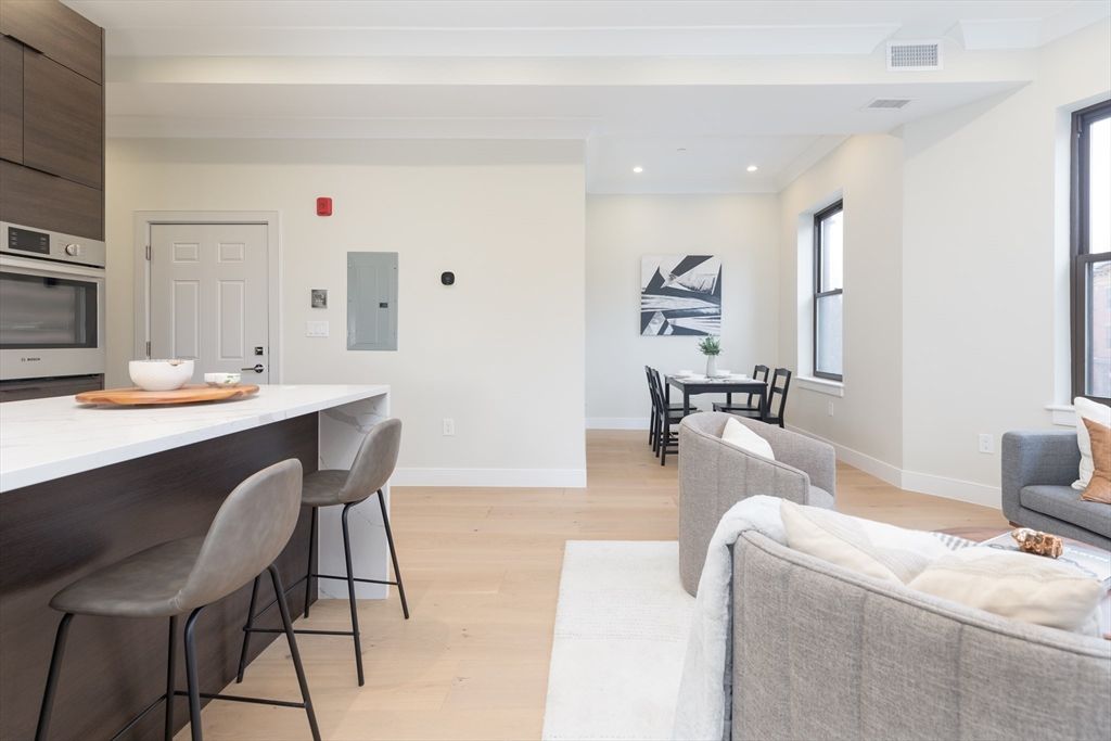 Dining room, Interior, Kitchen, Recessed Lighting, Stainless Steel Appliances, Wood Texture Flooring