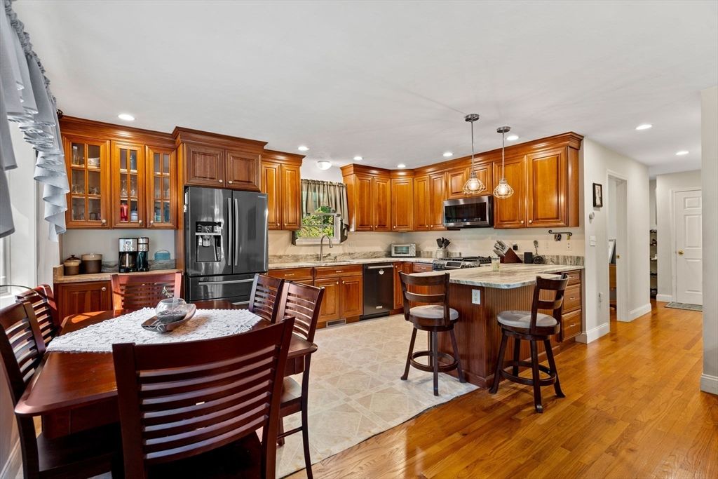 Dining room, Interior, Kitchen, Pendant Lights, Recessed Lighting, Stainless Steel Appliances, Wood Texture Flooring