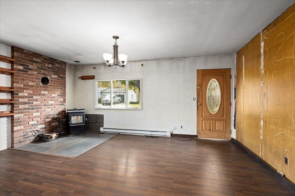Chandelier, Empty room, Fireplace, Interior, Stone Walls, Wood Texture Flooring
