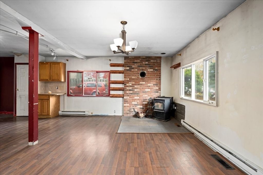 Empty room, Fireplace, Interior, Pendant Lights, Stone Walls, Wood Texture Flooring