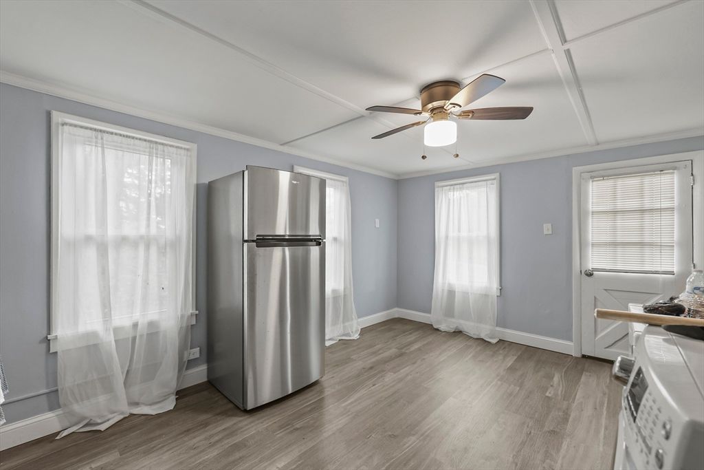 Empty room, Interior, Kitchen, Stainless Steel Appliances, Wood Texture Flooring